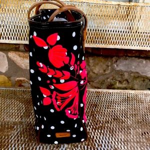 This original large Consuela tote has real leather straps and a pocket inside.